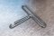 [12-ARA-1]  stahovací hák ARA-HOOK pro nerezové vázací pásky Multi-Lok a Wapro BAND-IT