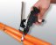 [12-WDP-1]  stahovací kleště WOODPECKER pro nerezová vázací pásky s ručním zastřiháváním pásku, pro pásky Ball-Lok a Multi-Lok š. 4,6 - 12 mm